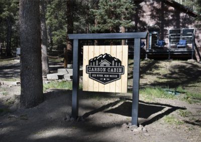 Carson Cabin signage makes it easy to locate from Pine St.